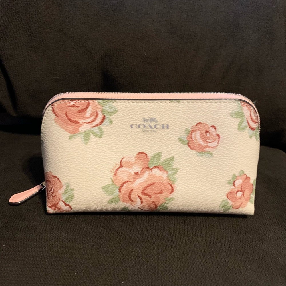 Coach pink and white leather floral cosmetic bag